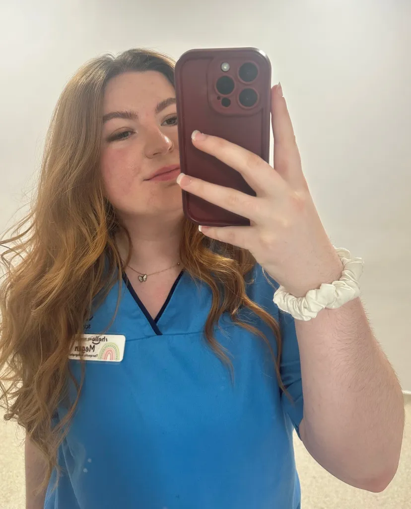 Megan Wright, a radiographer who discovered she had leukaemia after brushing off her unexplained bruises as pole dancing injuries, takes a selfie.