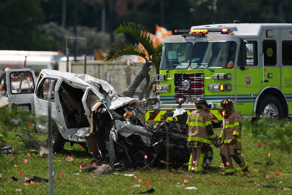 The wreckage of a van hit by a 21 Air plane at Miami International Airport.