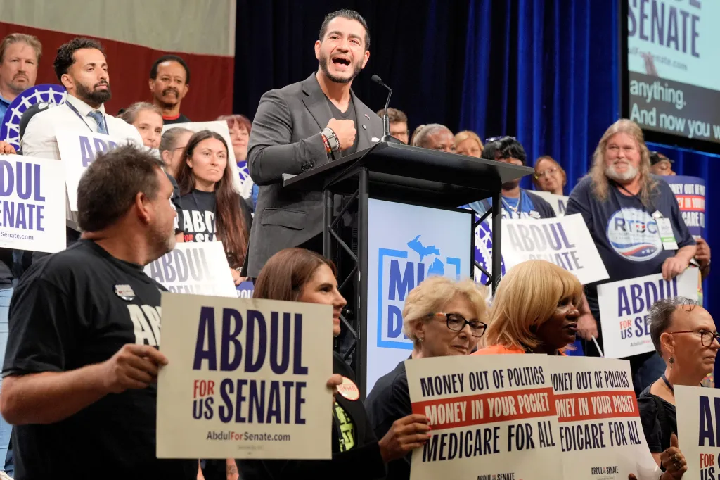 El-Sayed talks with the crowd during the Michigan Democratic Party convention on Saturday at the Lansing Center in Lansing.