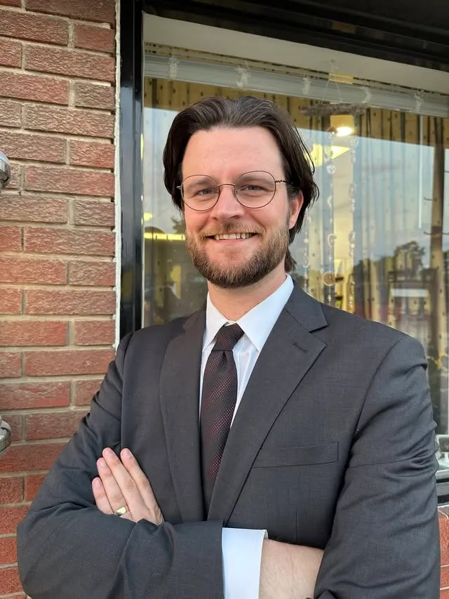 William Lawrence, Michigan swing district House candidate, smiling at the camera.