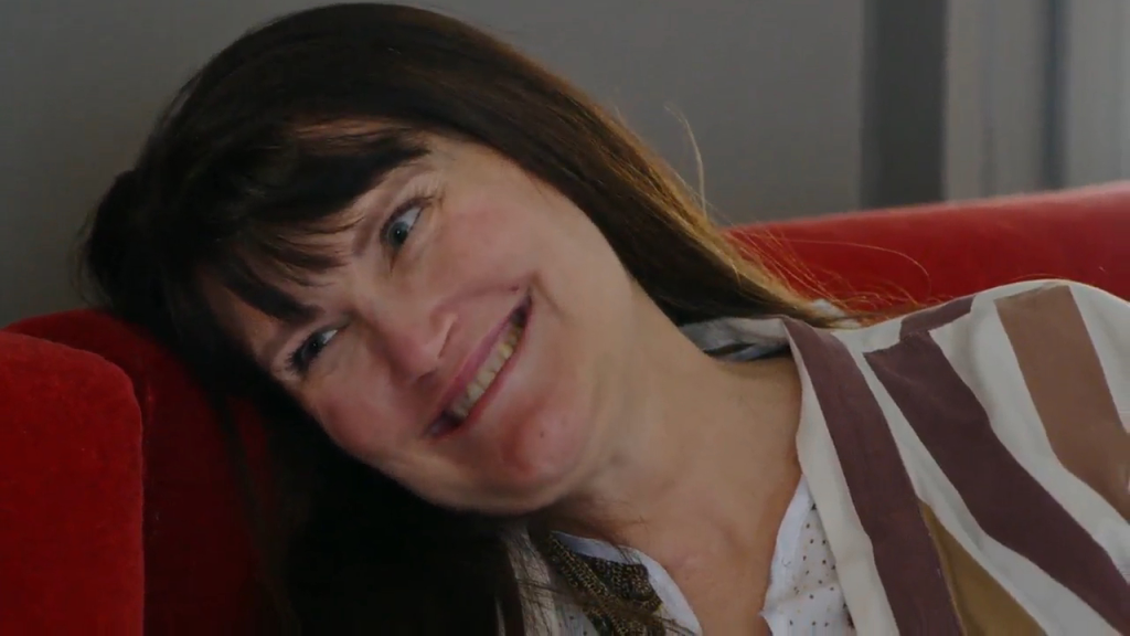 Debby making an uncomfortable facial expression.