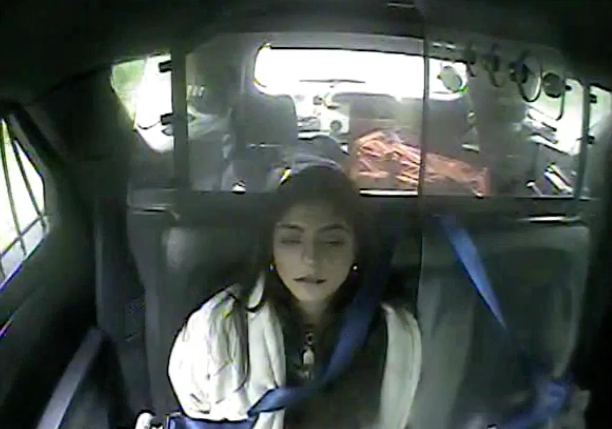 Milania Giudice inside a car, captured by a bodycam.