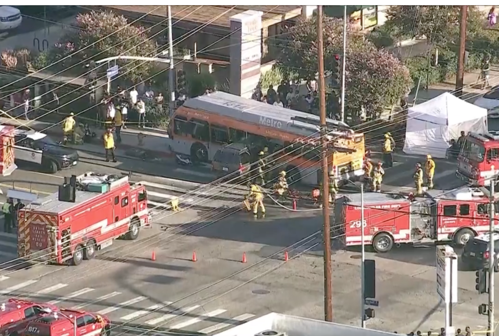 Firefighters work at the scene of a crash involving a Metro bus in Chatsworth.