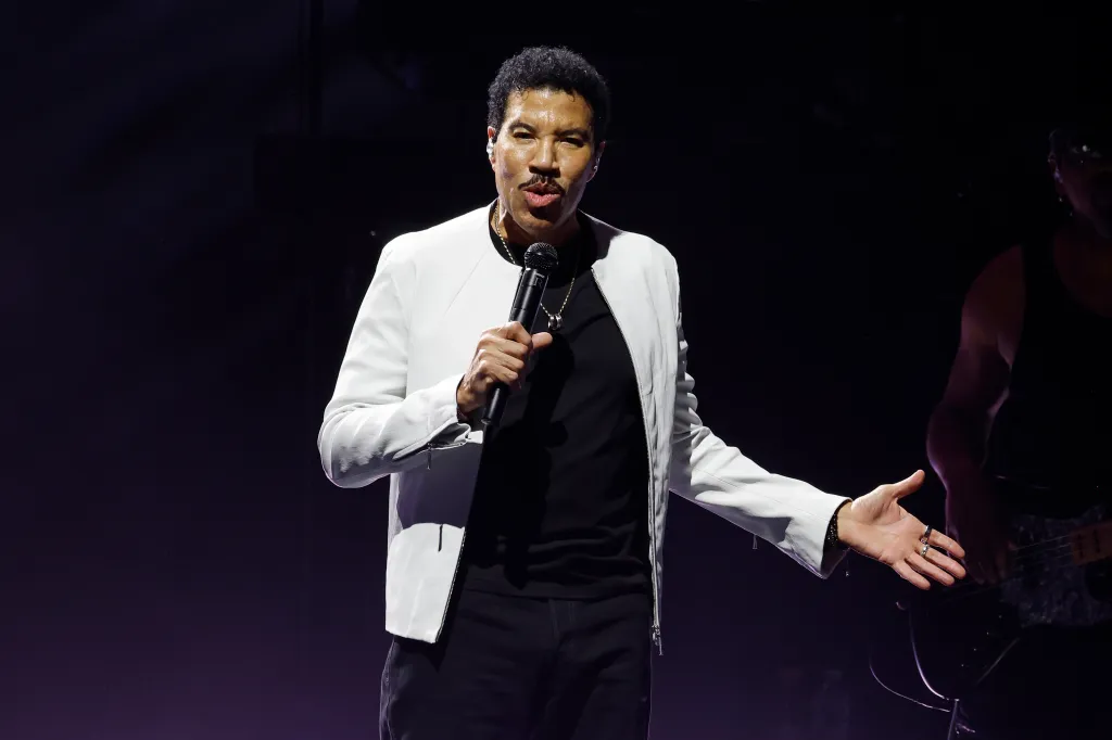 Lionel Richie performing on stage at the Acrisure Amphitheater.