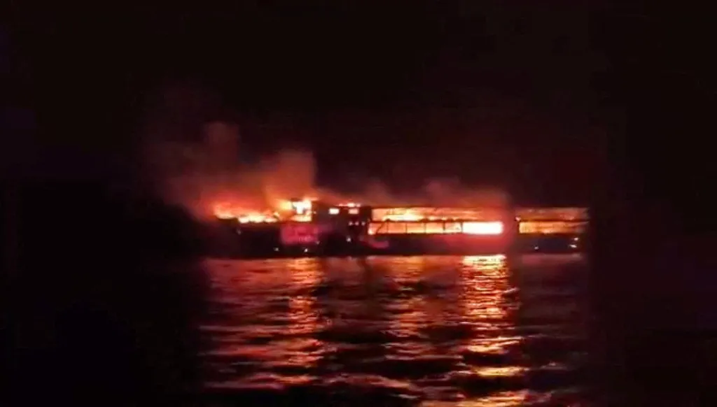 The MV June Aster burns as flames and smoke rise after a fire broke out on the ferry on, Sept. 10, 2026, off the coast of Palawan, Philippines.