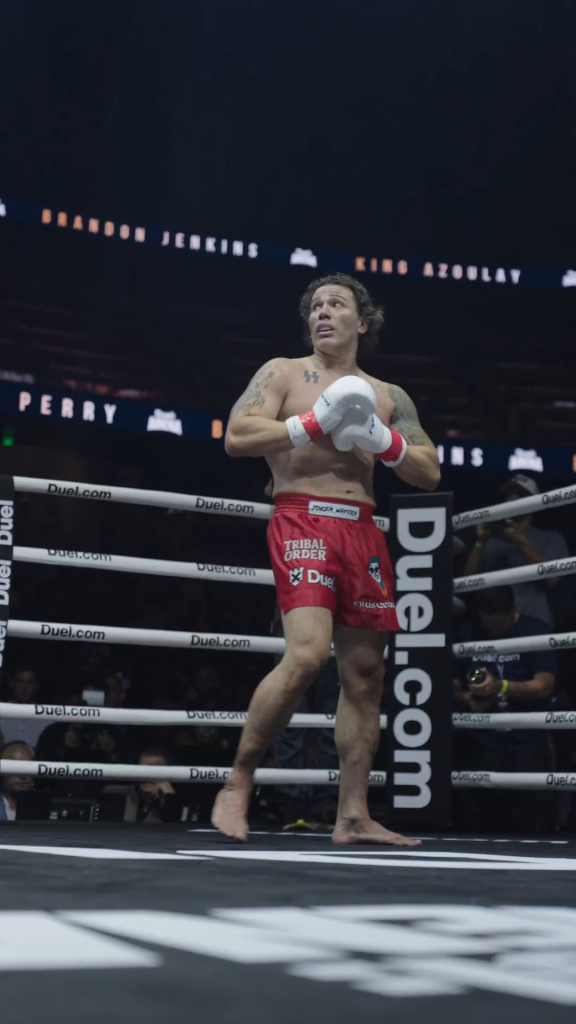 MMA fighter Paul Nicholas Miller in a boxing ring.
