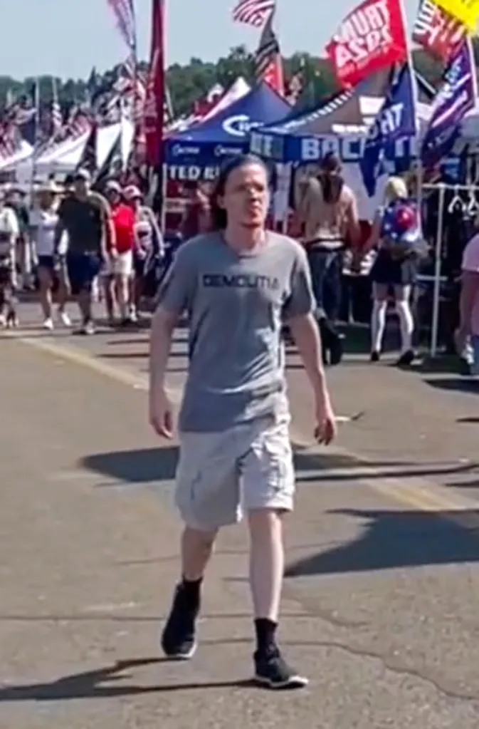 Video still of Thomas Crooks walking around a Trump rally.