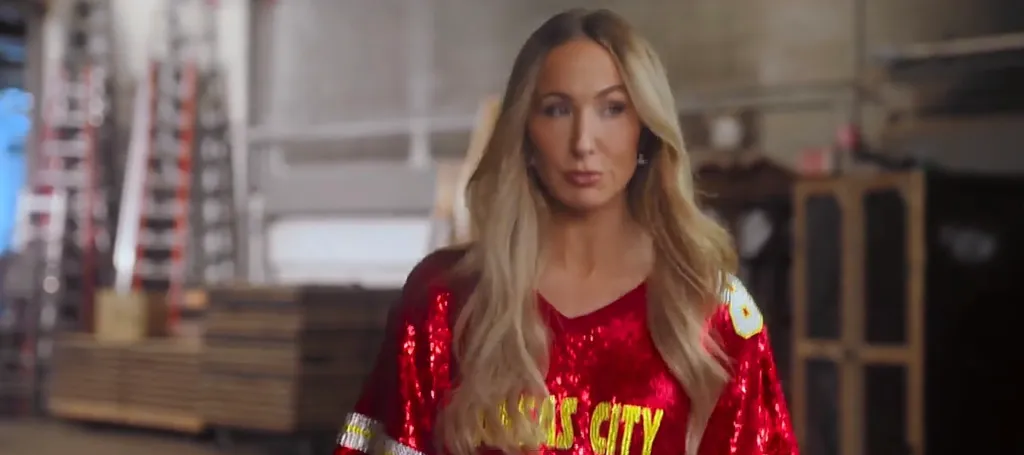 Nikki Glaser in a pre-game ad, wearing a sequined red Kansas City Chiefs jersey.