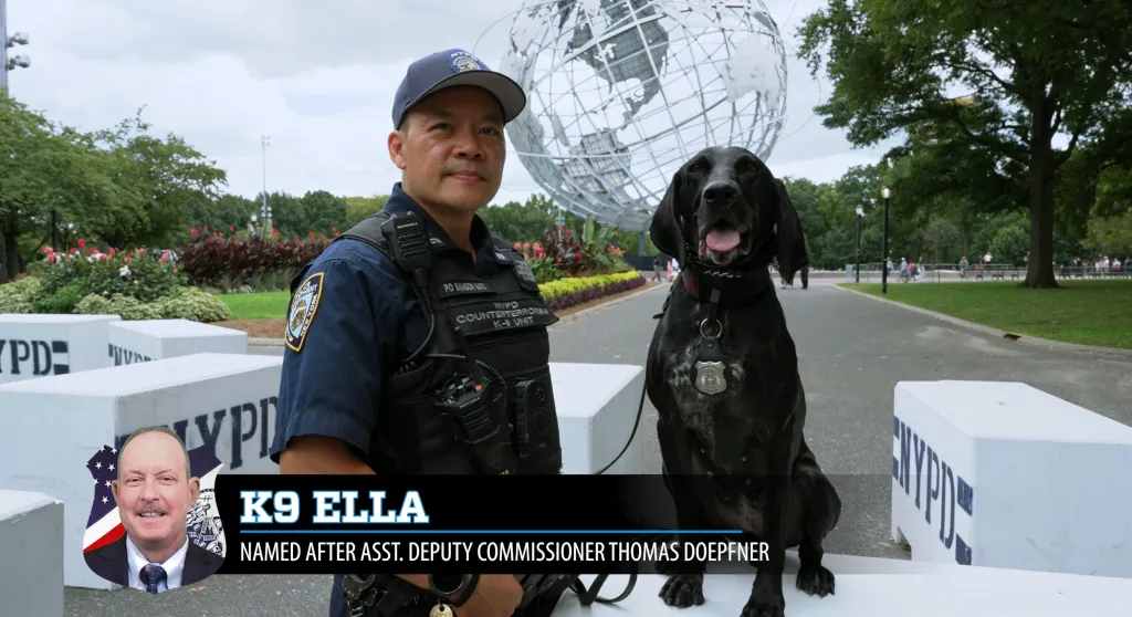 NYPD officer and K-9 Ella, named after Assistant Deputy Commissioner Thomas Doepfner, pose outdoors with the Unisphere in the background.