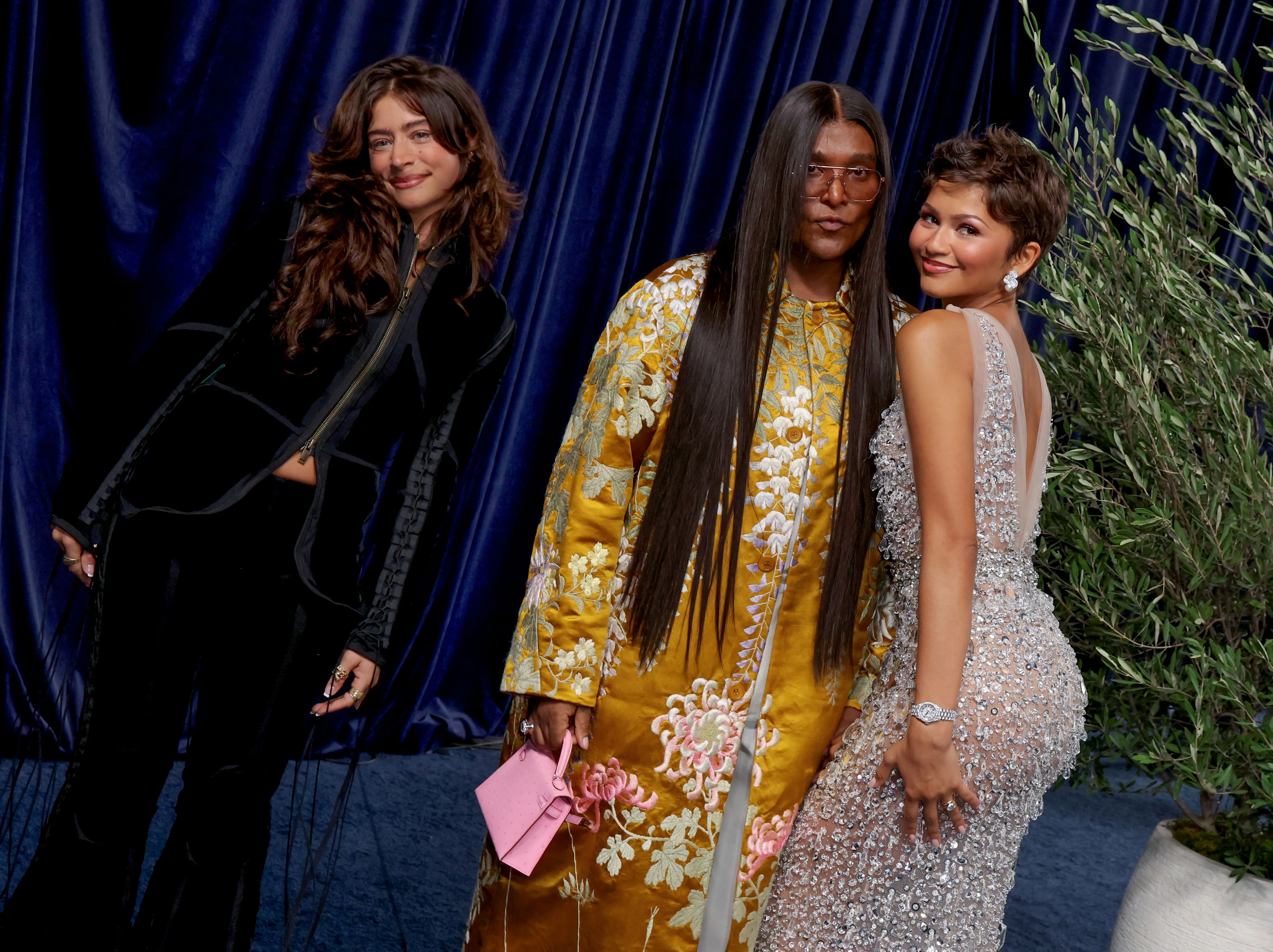 Odessa A'zion, Law Roach, and Zendaya pose on the red carpet at the 78th Primetime Emmy Awards.