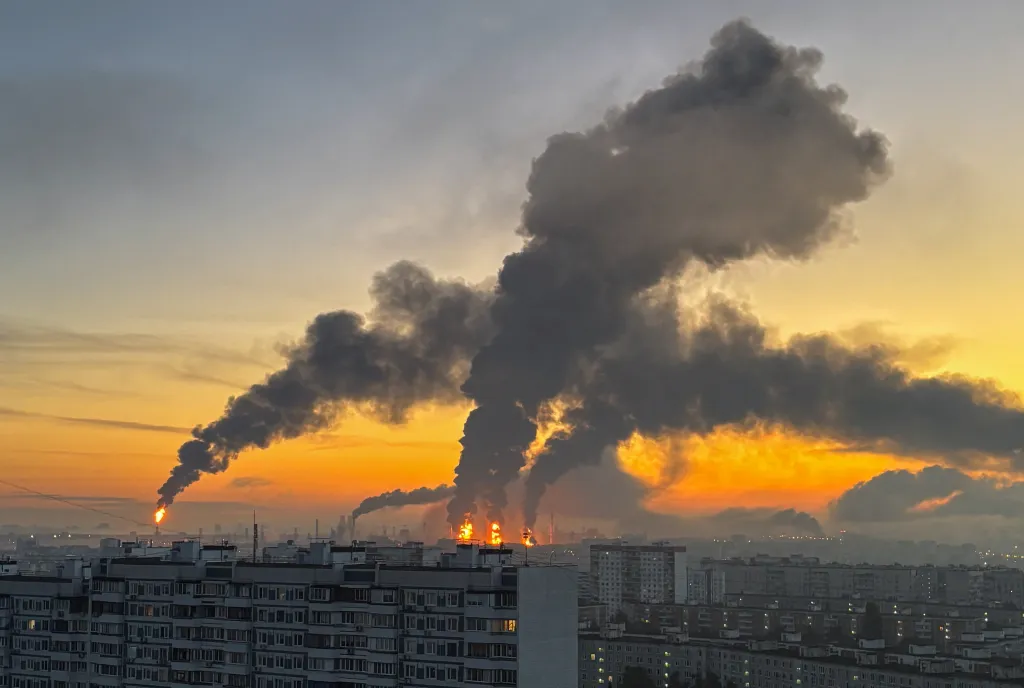 Plumes of smoke rise from fires at an oil refinery following what authorities say was a Ukrainian drone strike in Moscow, Russia, on Sept. 20, 2026.