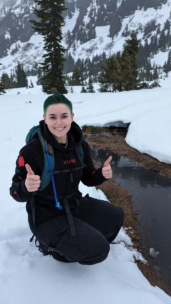 OnlyFans creator Kit Barrus in a black jacket in the snow