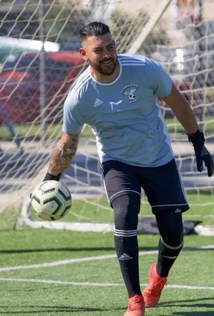 Pablo Gomez, a soccer player, holding a soccer ball.