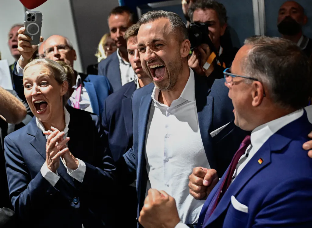 Ulrich Siegmund, Alice Weidel, and Tino Chrupalla celebrate after exit polls for Saxony-Anhalt's state elections.