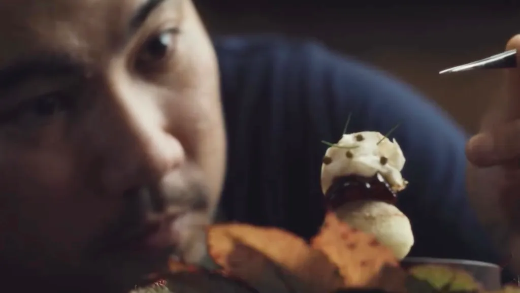 Patrick Gabon, chef and co-owner of Restaurant Naides, garnishing a dish.