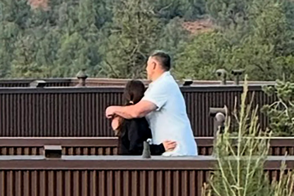 Mike Vrabel and Dianna Russini embracing at Ambiente Sedona hotel.
