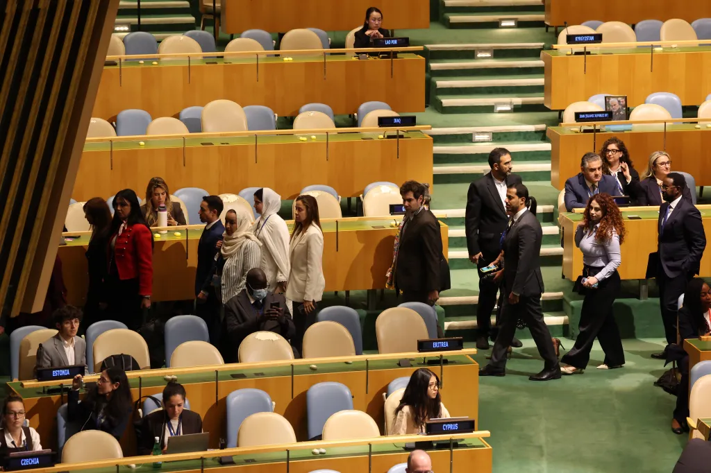 Attendees walk out during the 81st session of the United Nations General Assembly.