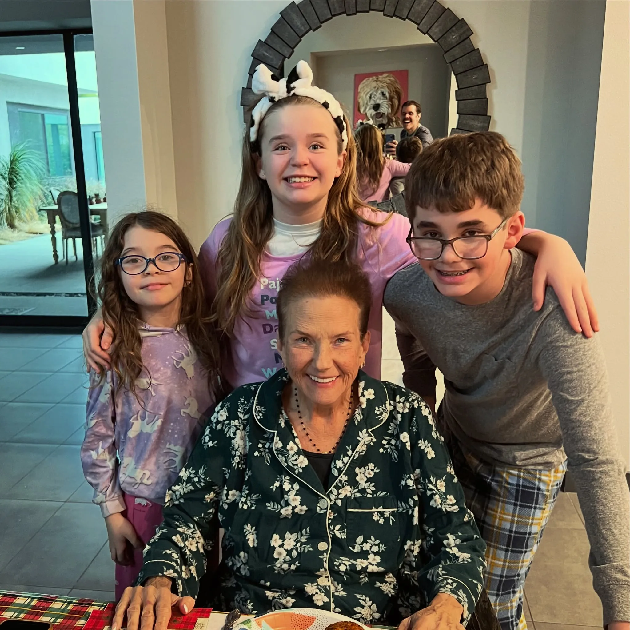 Perez Hilton's three children pose with their grandmother.