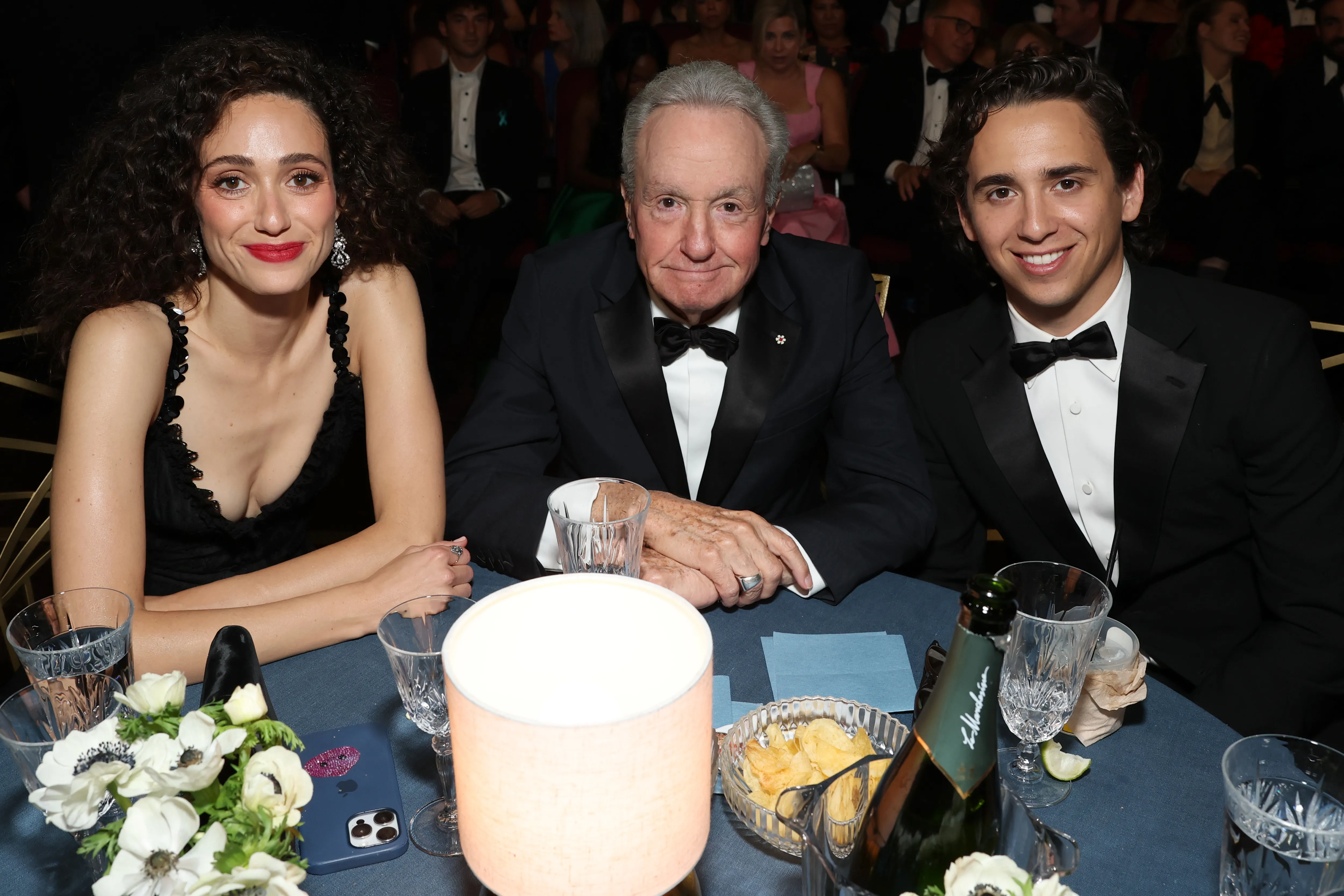 Emmy Rossum, Lorne Michaels, and Marcelo Hernandez at the 78th Primetime Emmy Awards.