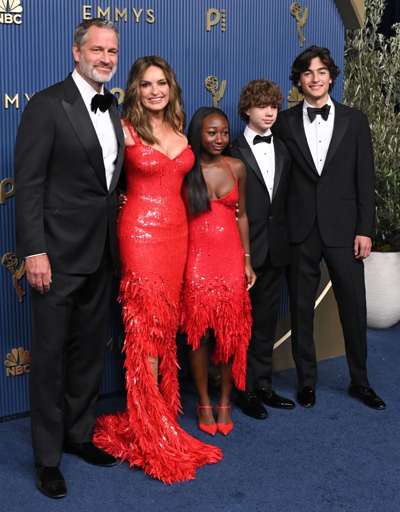 Peter Hermann and Mariska Hargitay with their two children pose for a photo.