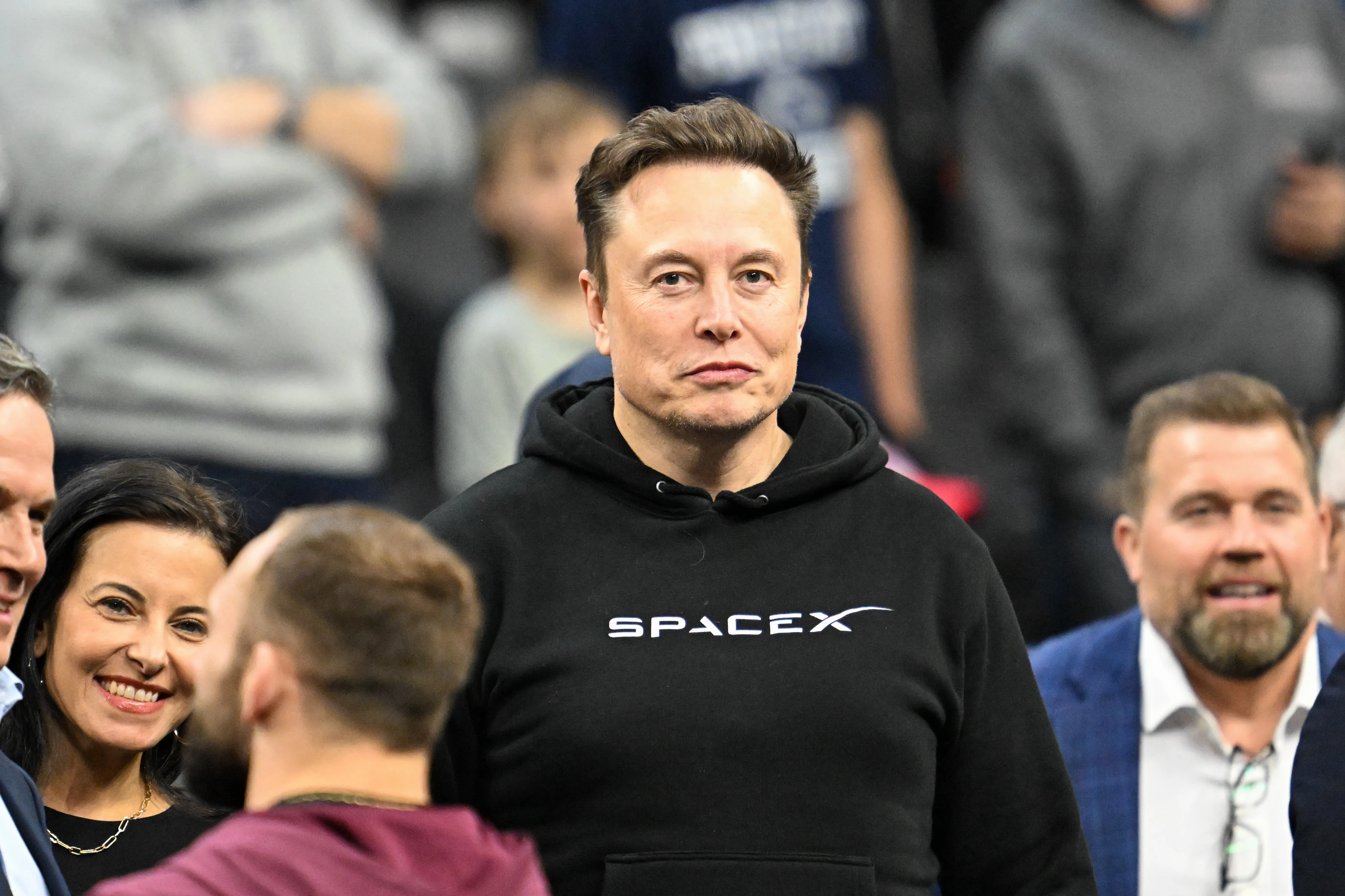 Elon Musk attends the NCAA Division 1 wrestling national championship finals.
