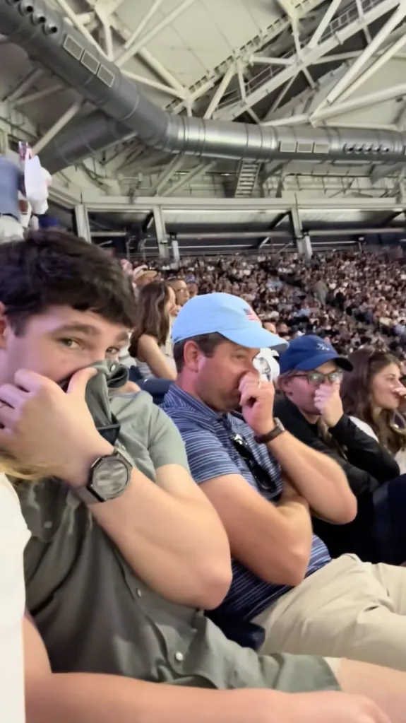 US Open attendees holding their noses. 