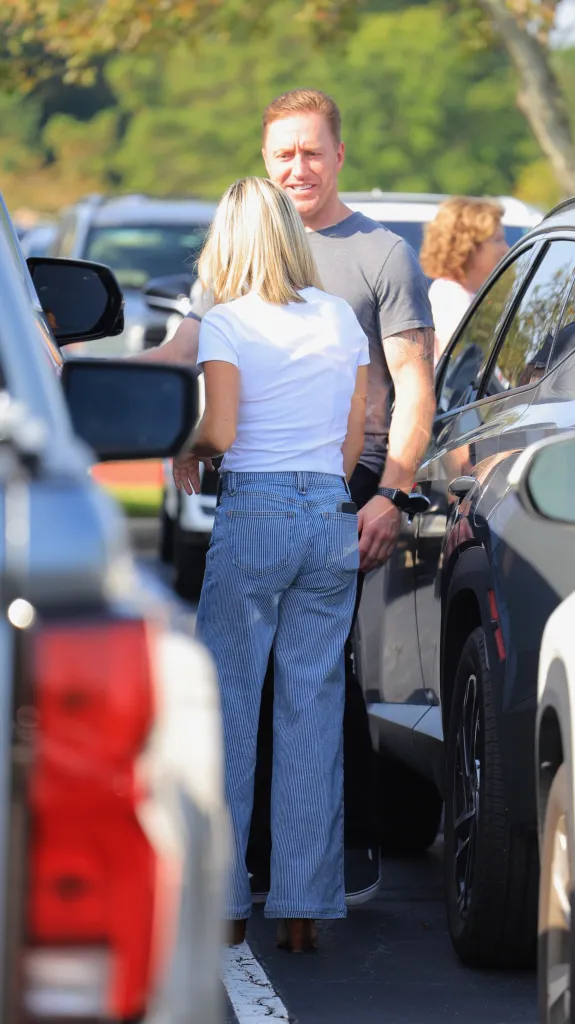 Kroy Biermann and Jillian Green outside of a church.