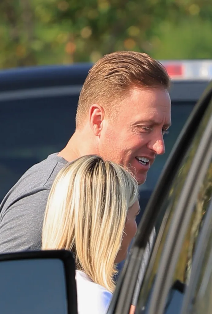 Kroy Biermann and Jillian Green leaving church.