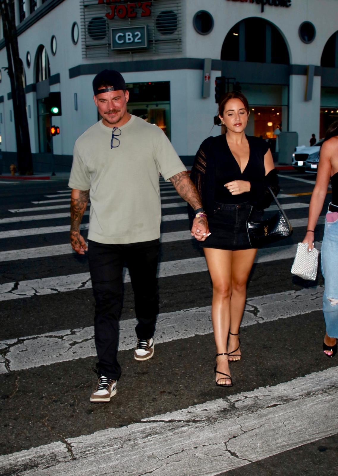 Jax Taylor and Lori Krebs holding hands as they arrive at The Laugh Factory.