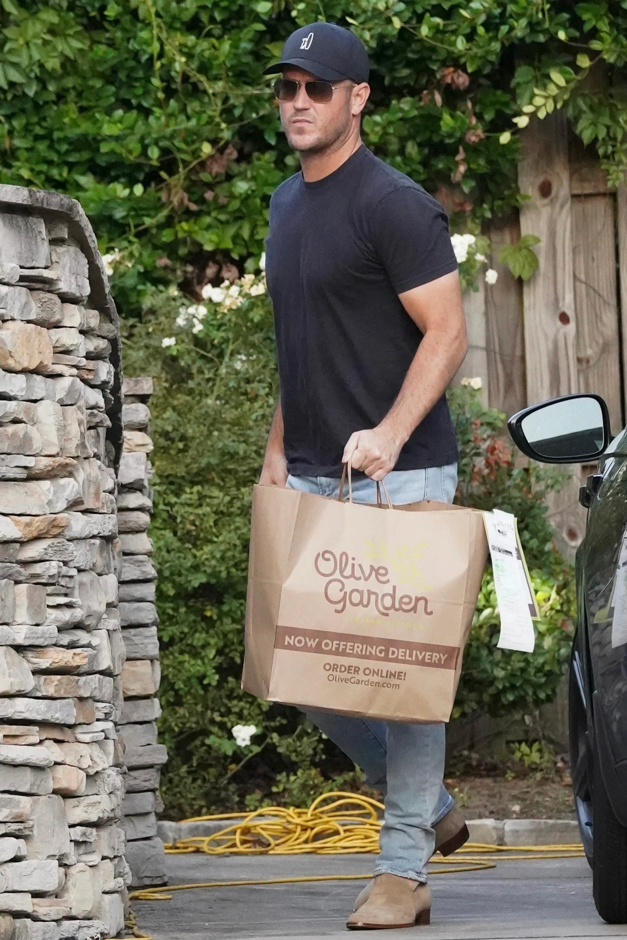 Zach Hickerson arriving with Olive Garden takeout in South Carolina.