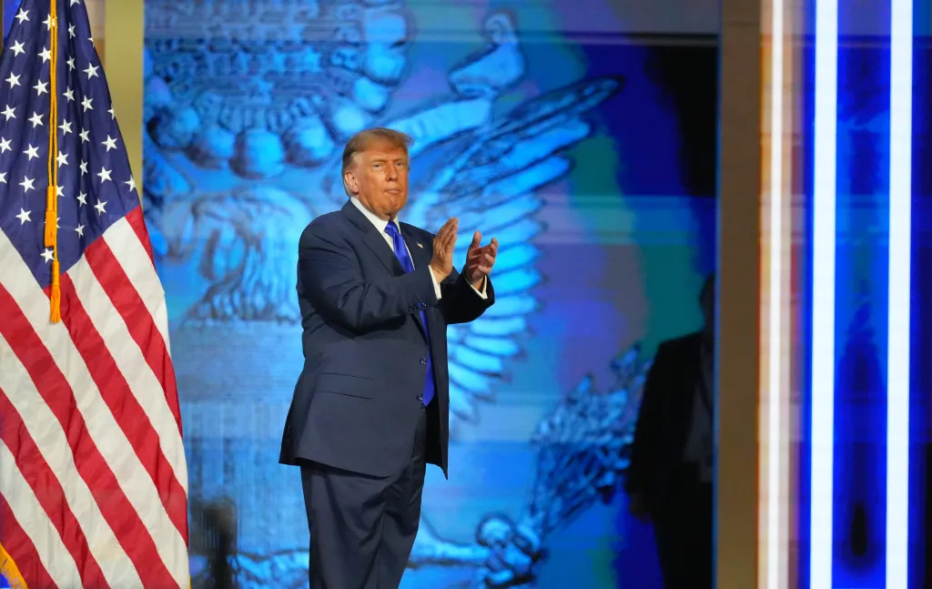 President Donald Trump claps after finishing his speech at the Republican convention.