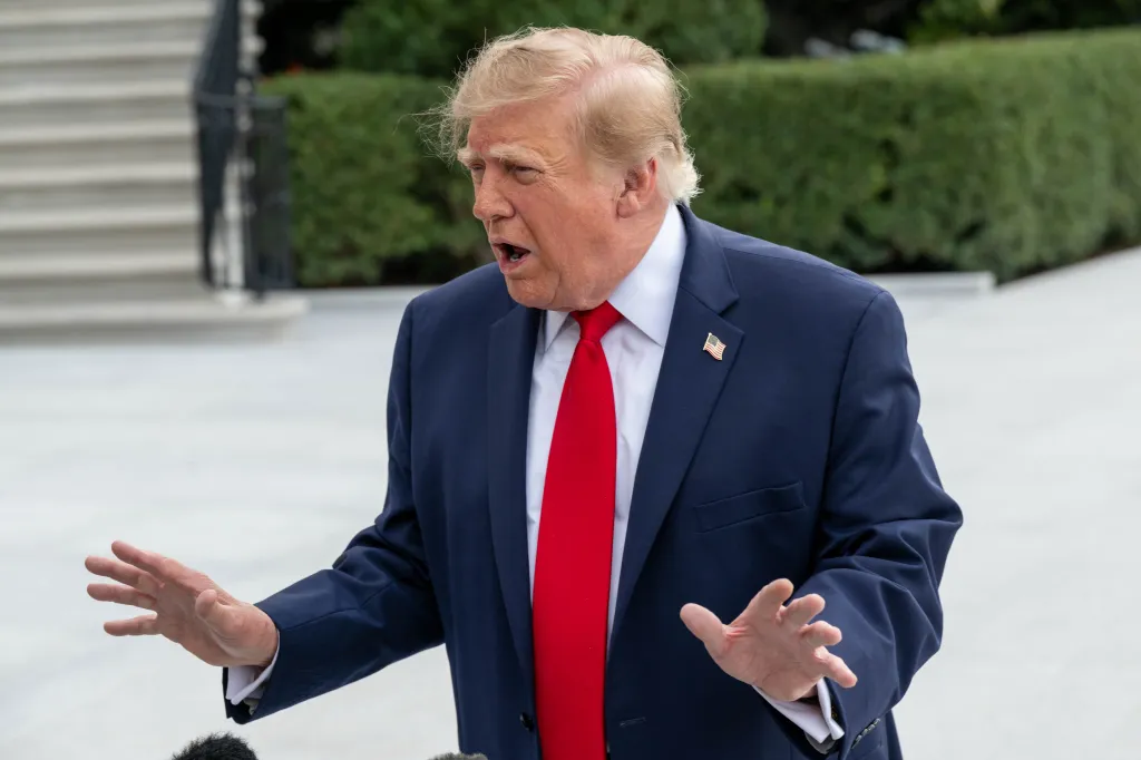 President Donald Trump speaks to reporters at the White House before traveling to Tennessee.