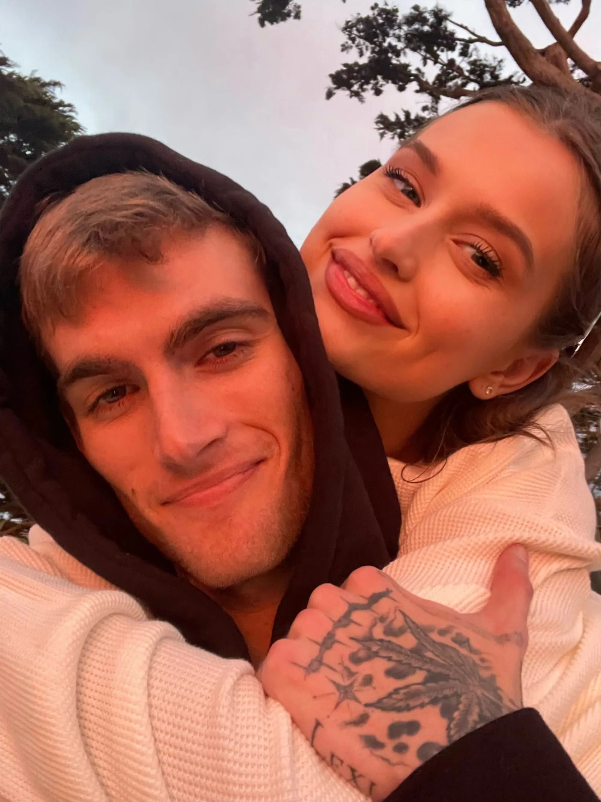 Lexi Wood embracing Presley Gerber.