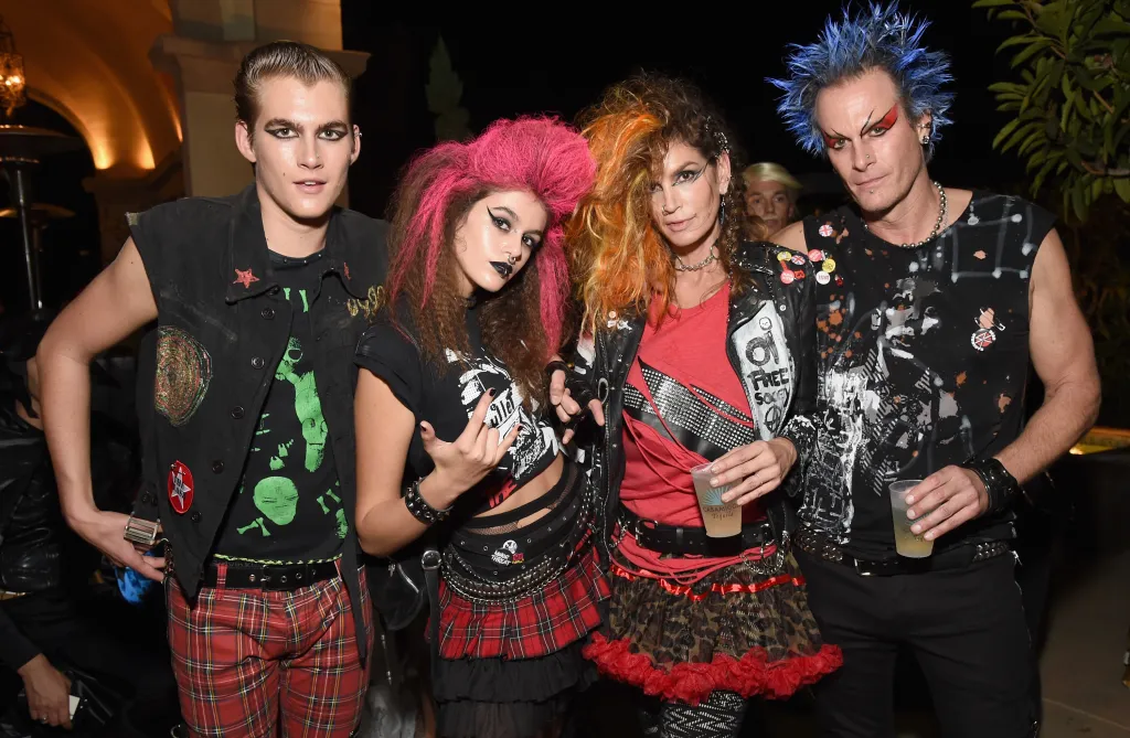 Presley Walker Gerber, Kaia Jordan Gerber, Cindy Crawford and Rande Gerber dressed in punk rock attire at the Casamigos Halloween Party.