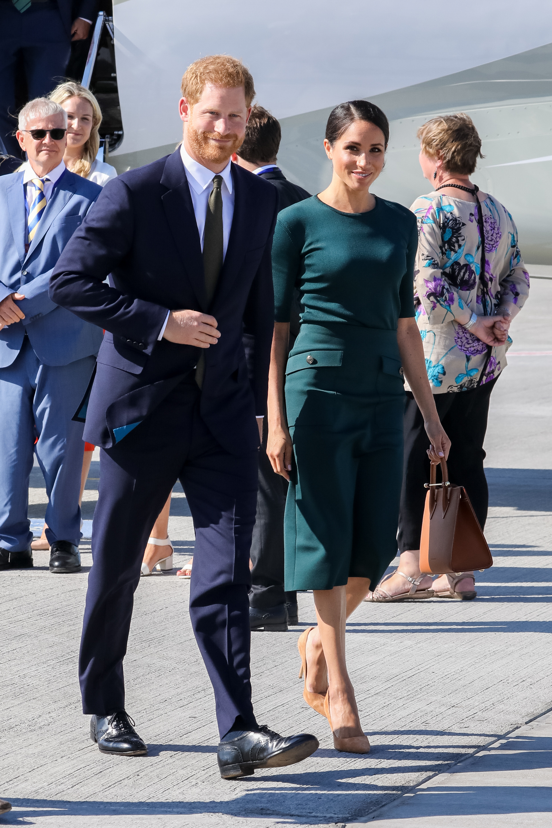 Prince Harry, Duke of Sussex, and Meghan Markle, Duchess of Sussex, walking together.