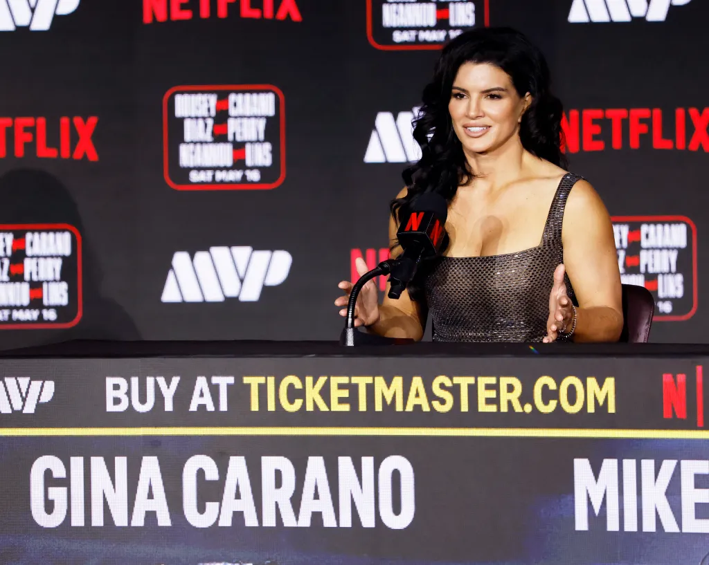 Gina Carano speaks at a press conference for her MMA fight against Ronda Rousey.