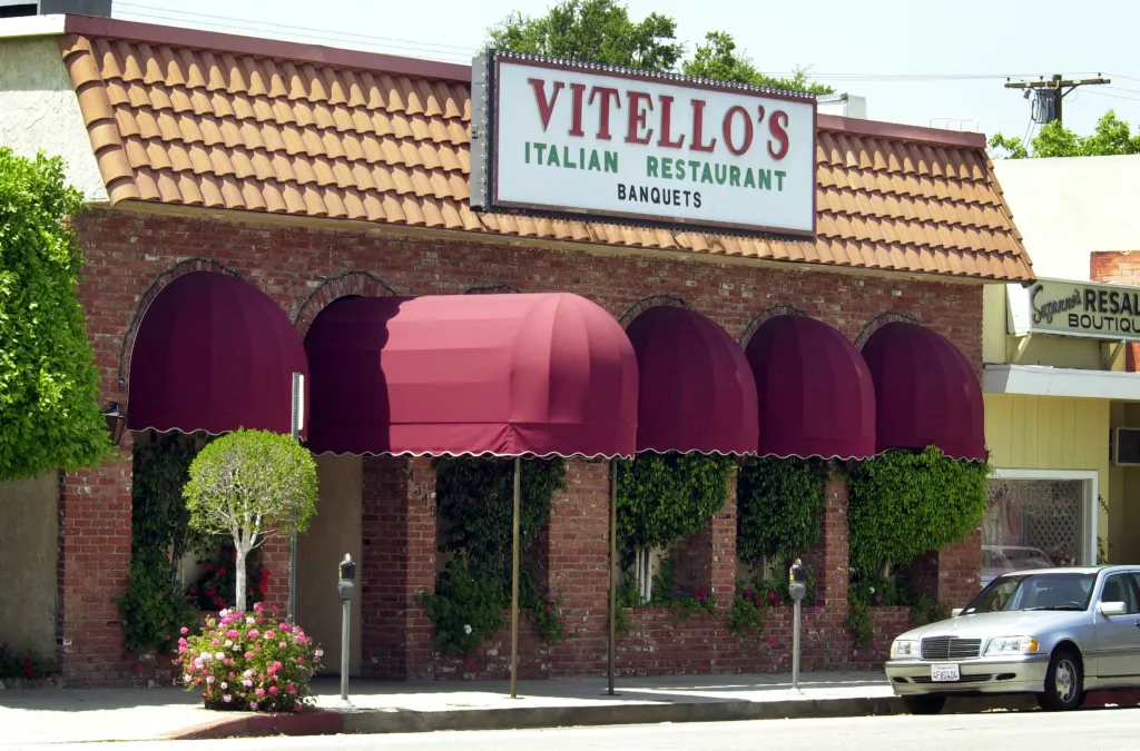The exterior of Vitello's Italian Restaurant with a sign that reads 