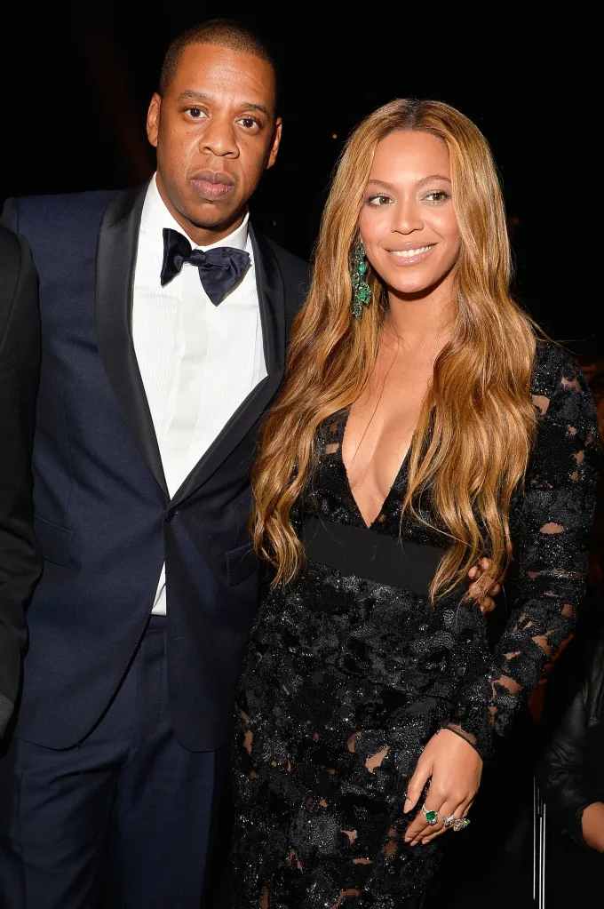 Jay-Z and Beyoncé posing together at the 57th Grammy Awards.
