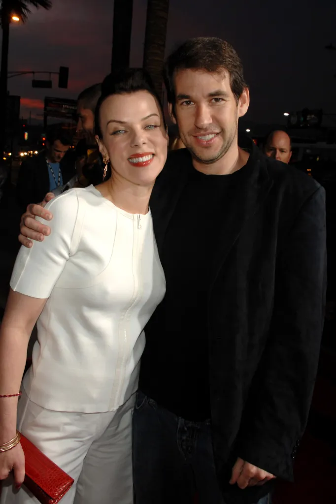 Debi Mazar and Doug Ellin posing together at the 