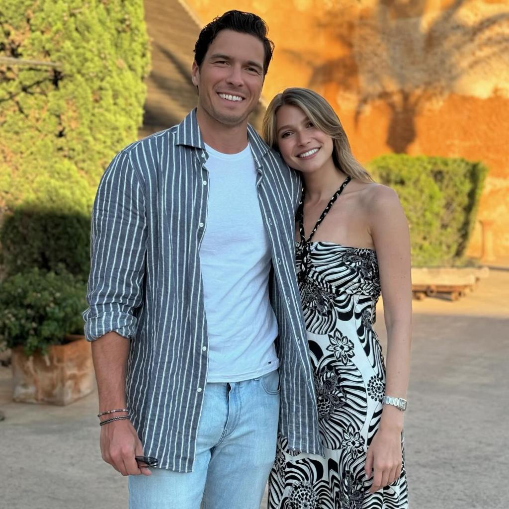 Will Reeve and wife Amanda posing outdoors.