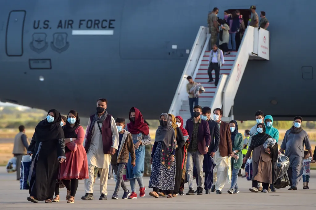 Refugees disembark from a US Air Force aircraft after an evacuation flight from Kabul at the Rota naval base in Rota, southern Spain, on Aug. 31, 2021. 