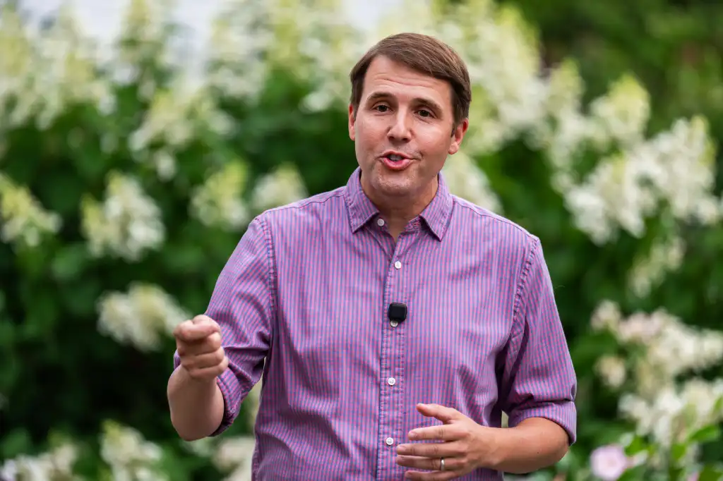 Rep. Chris Pappas speaks with voters in Warner, N.H.