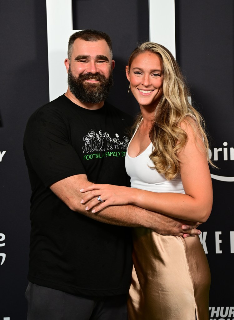 Jason Kelce and Kylie Kelce smile at the premiere of 