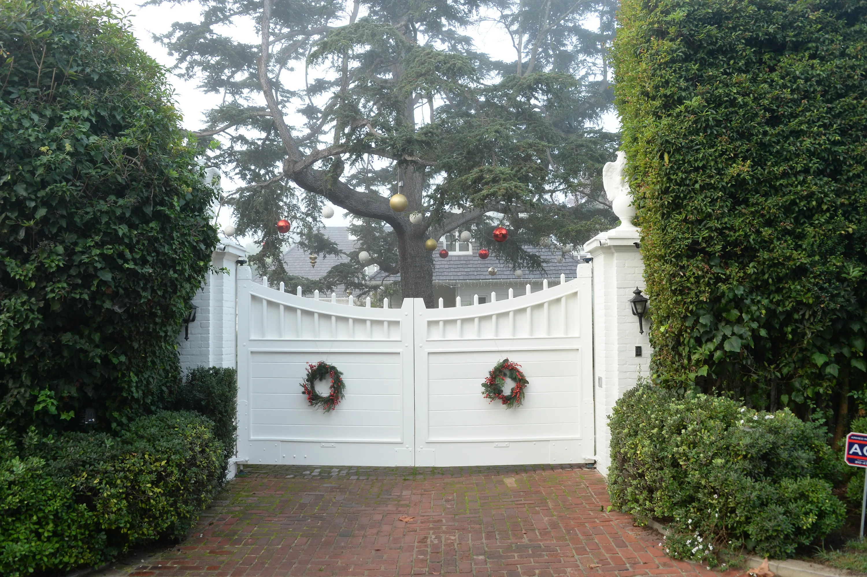 Rob Reiner's home in Brentwood, CA, decorated with Christmas wreaths and ornaments, after a homicide.
