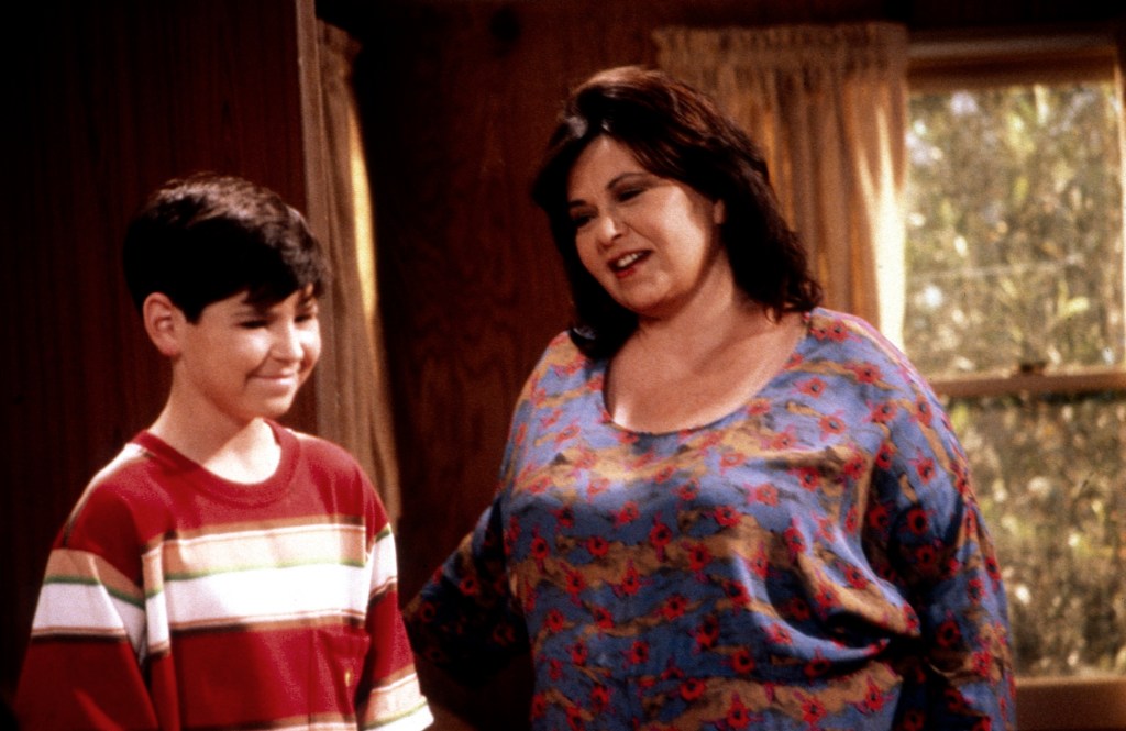 Michael Fishman and Roseanne Barr smiling.