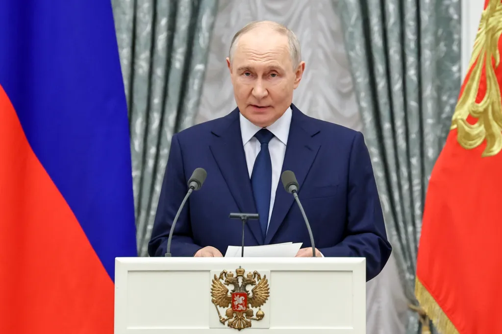 Russian President Vladimir Putin speaking at an awards ceremony.