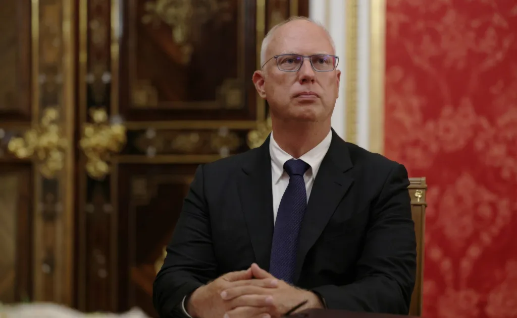 Russian Special Presidential Representative Kirill Dmitriev listens during a meeting.