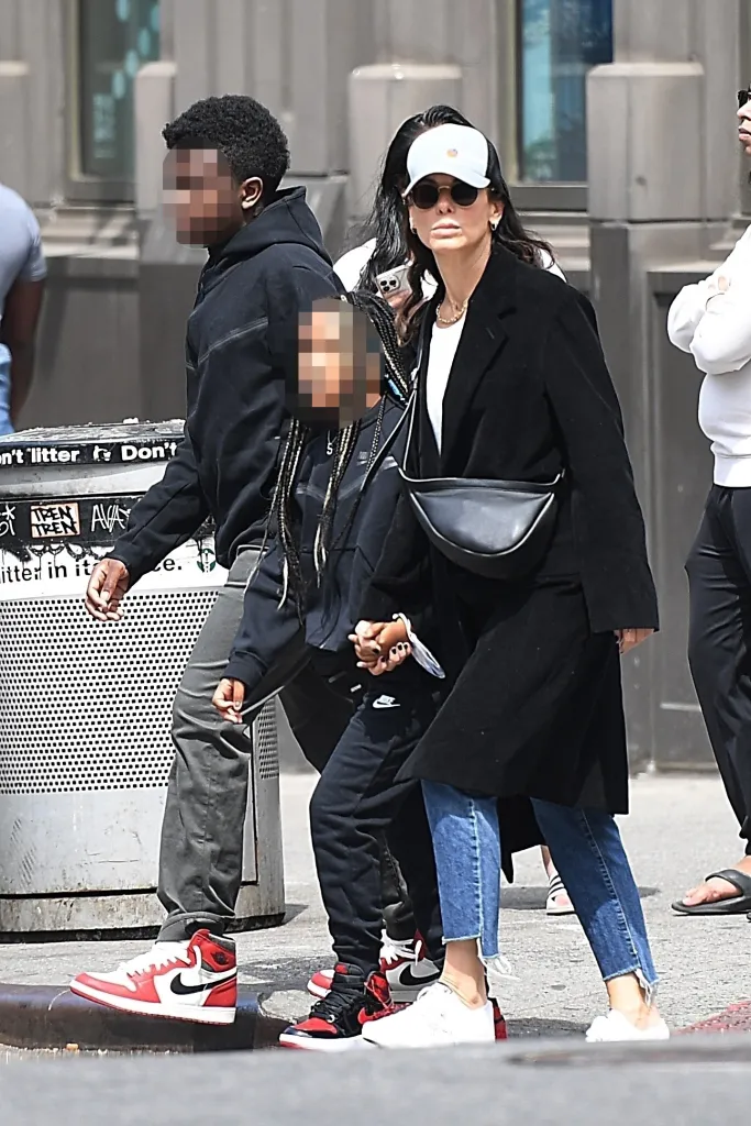 Sandra Bullock walking with her son, Louis, and daughter, Laila, in Manhattan.