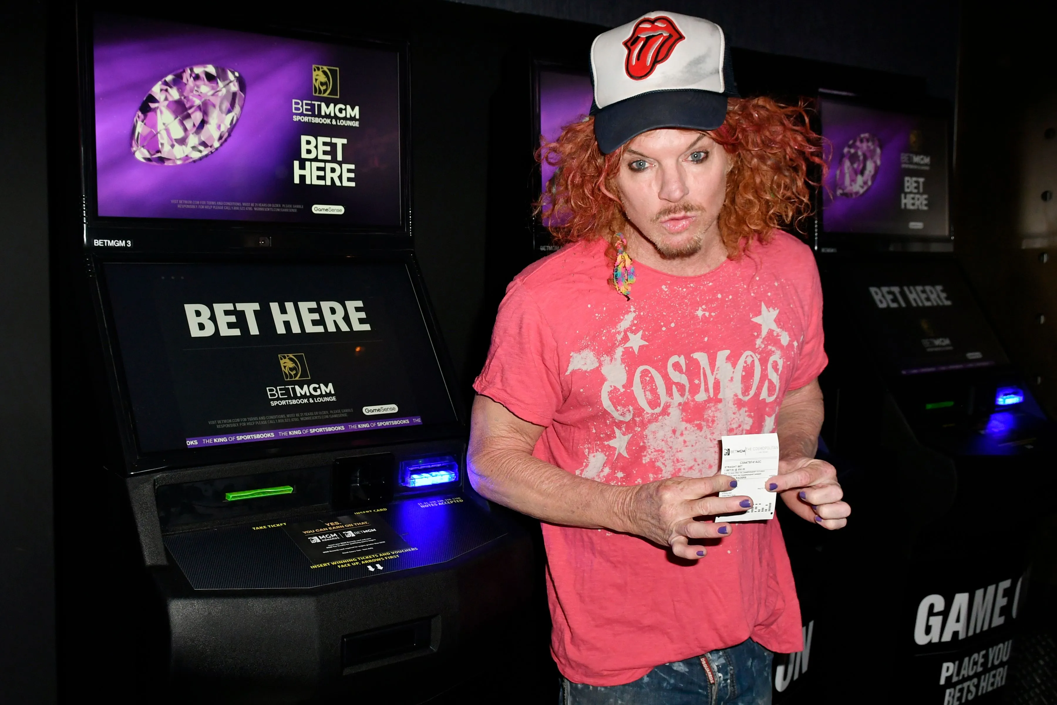 Scott Thompson, also known as Carrot Top, placing his first wager at the opening of BetMGM Sportsbook at The Cosmopolitan of Las Vegas.