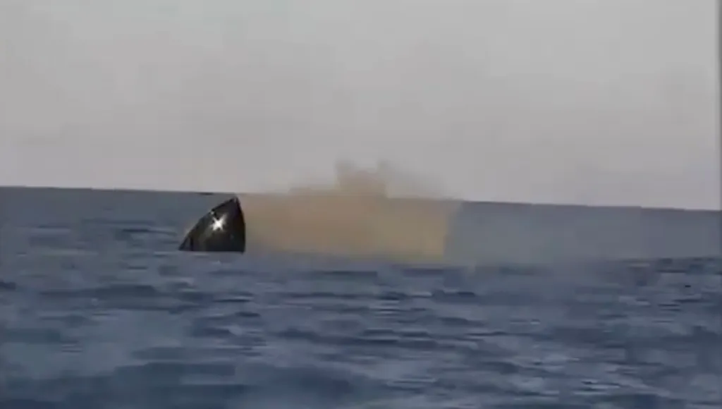 Ukrainian naval drone destroying a Russian unmanned boat in the Black Sea.